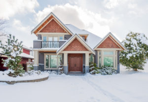 house with snow on roof